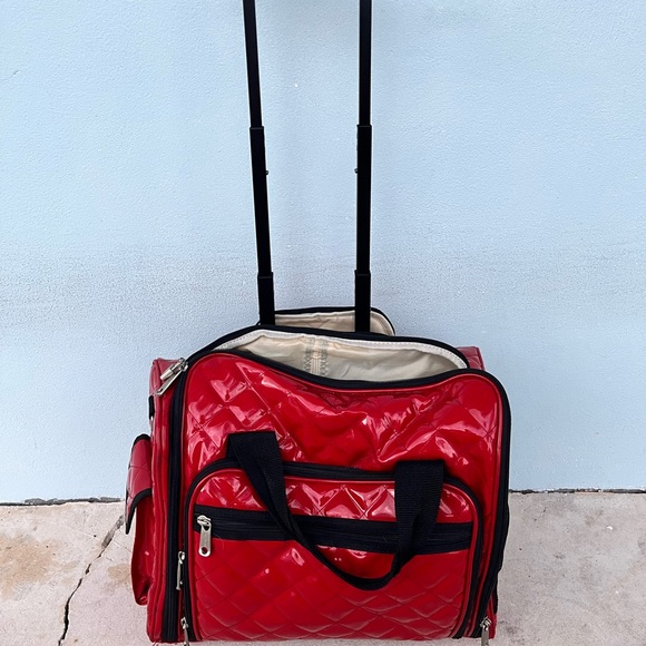 Travel computer or small duffle bag with wheels and extended handle for travel - Picture 9 of 16